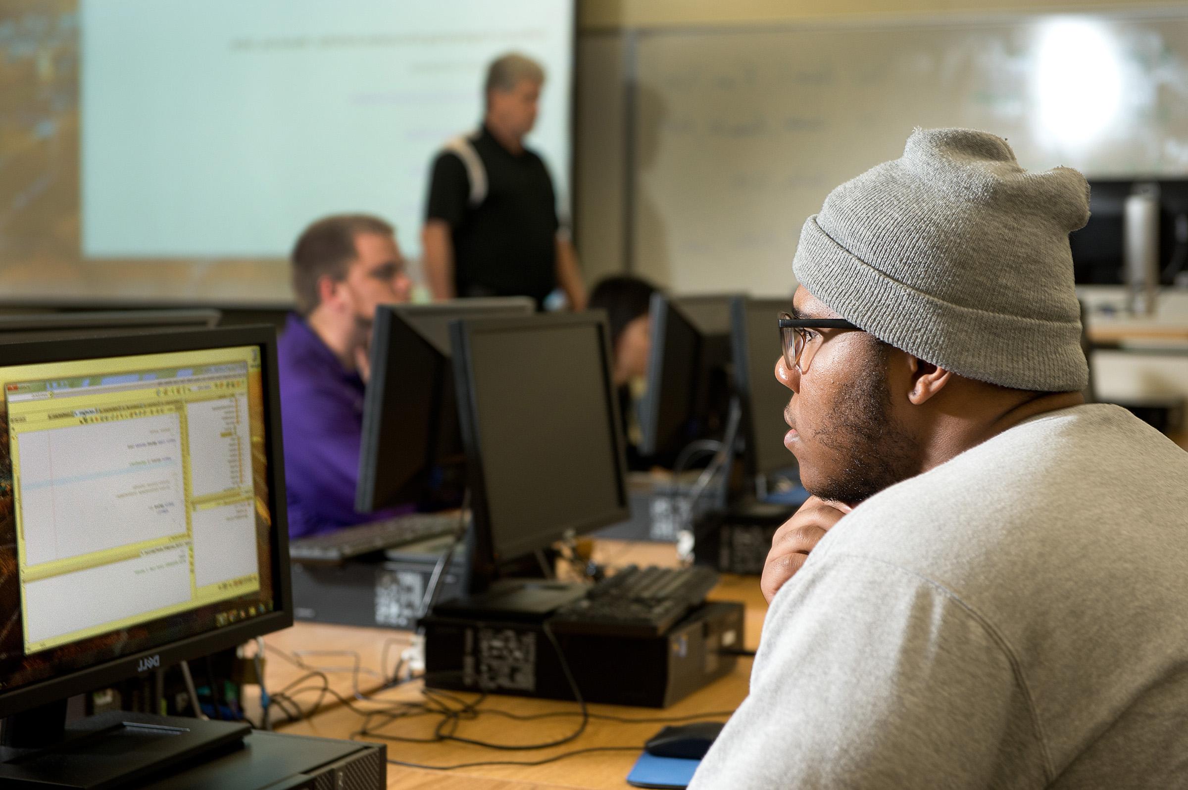 Computer Science students working in a computer lab 